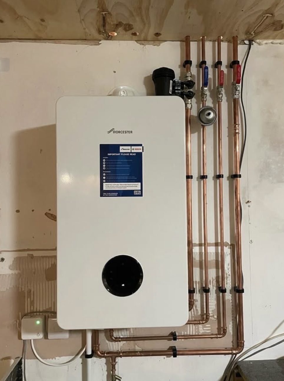 Worcester boiler with copper pipework, service valves and a MagnaClean filter